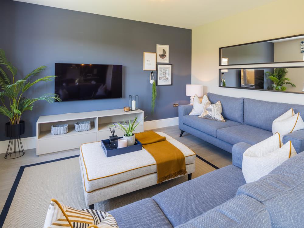 Family room of the Henley, a 4 bedroom house