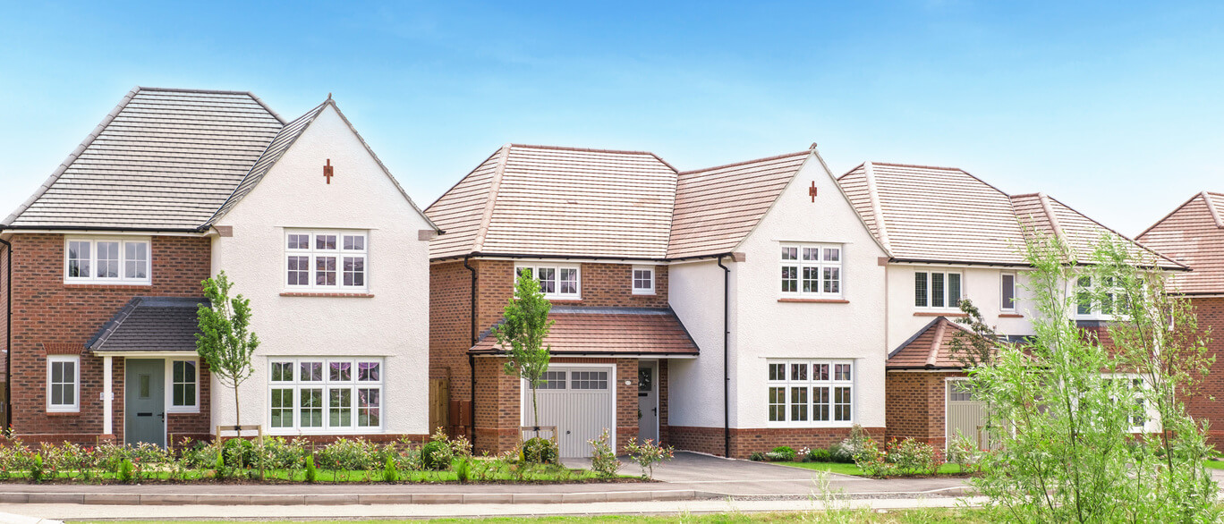 A row of modern newly built brick and render houses at Abbey Fields