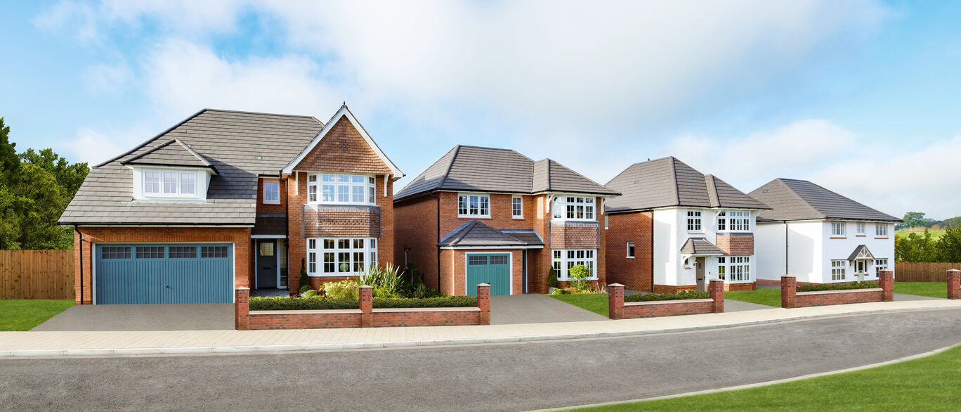 A row of modern detached houses with brick and white exteriors, front gardens, and driveways under a blue sky at Oak Brook Manor.
