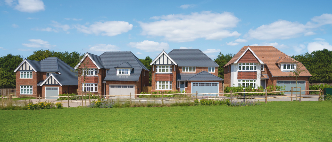 Redrow Paddock Green street scene of stylish premium detsched homes