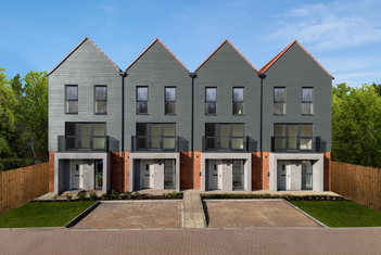 The Portman 3 bedroom external, with black cladding, landscaped surroundings and a balcony