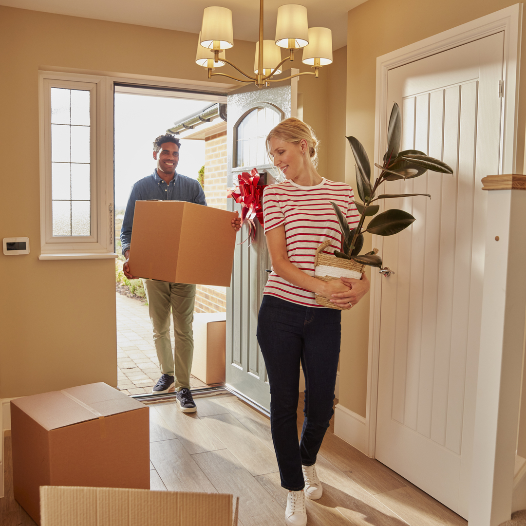 A couple moving into their new home
