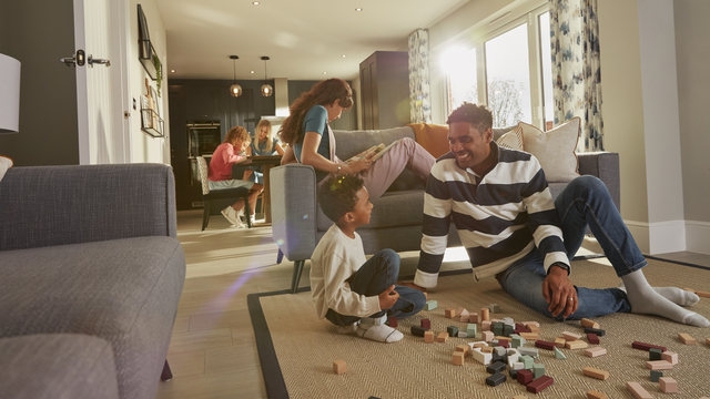 Father and Son playing in open plan living