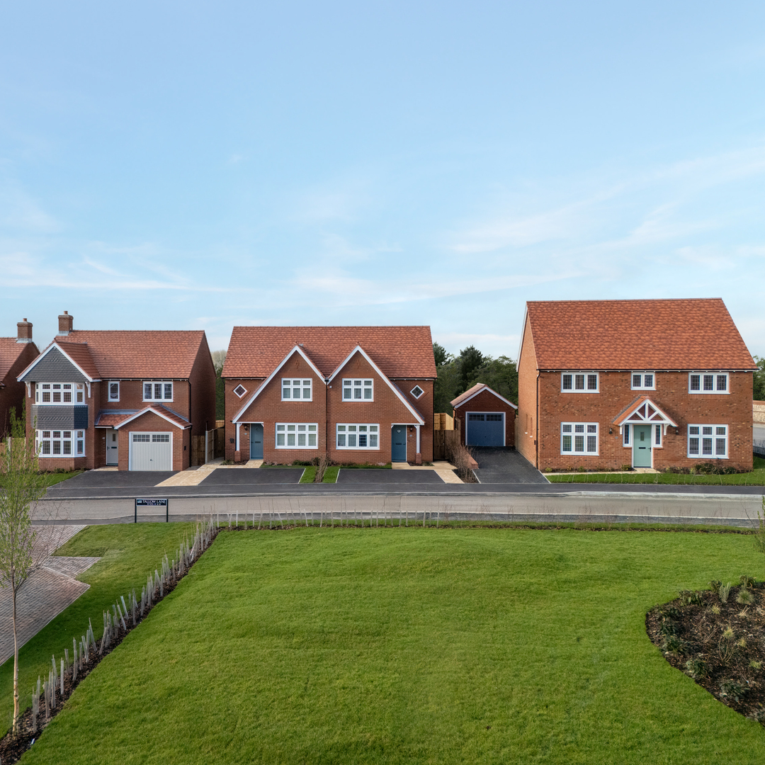 Street scene showing detached and semi detached homes at a Redrow development