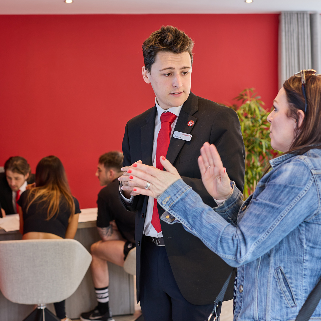 Sales expert advising customer on Part Exchange