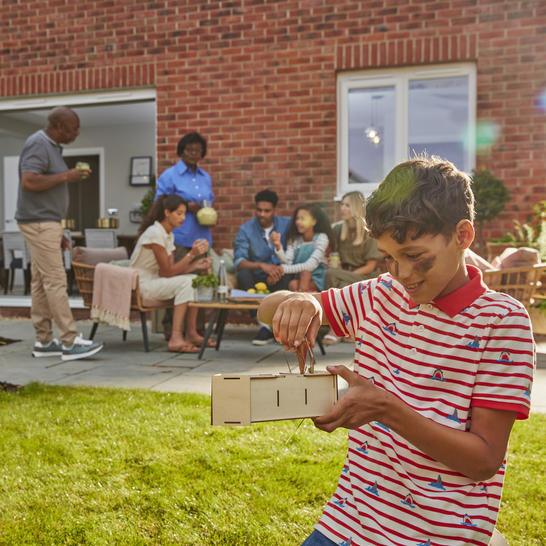 Family and friends gathered in Redrow garden