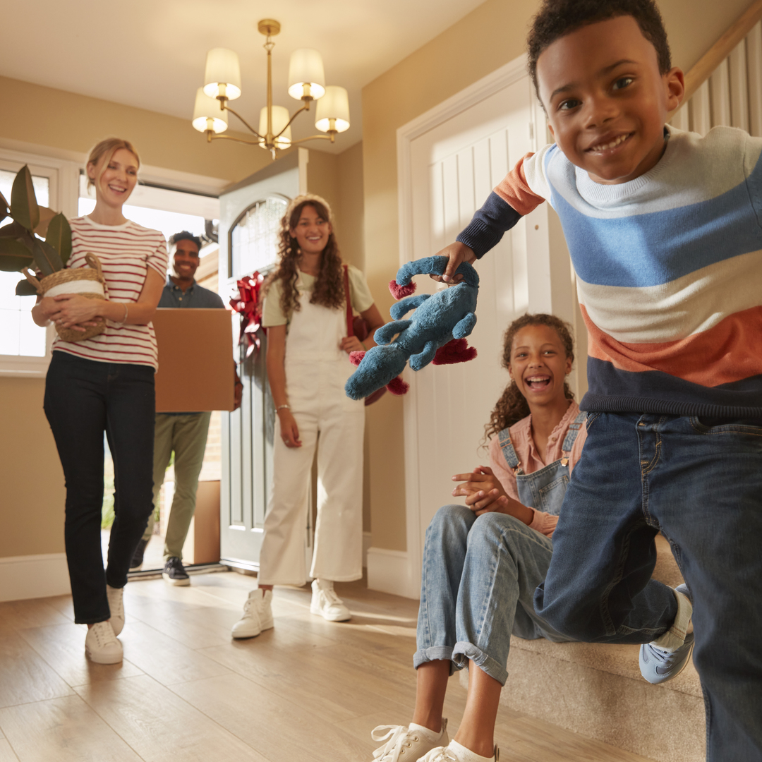 Family move into their new home