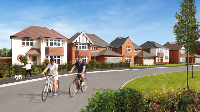 2 people take a bike ride by Heritage Collection homes