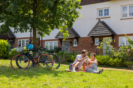 Couple resting by Heritage homes