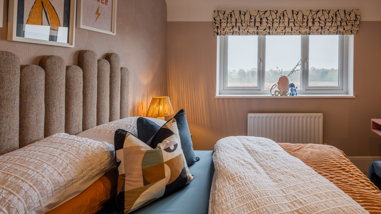 Cosy bedroom with padded headboard