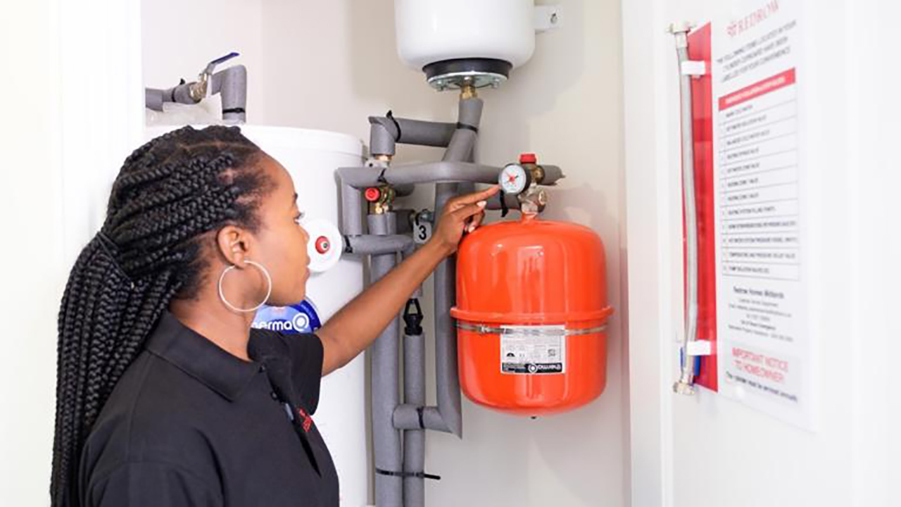 Woman adjusting system pressure