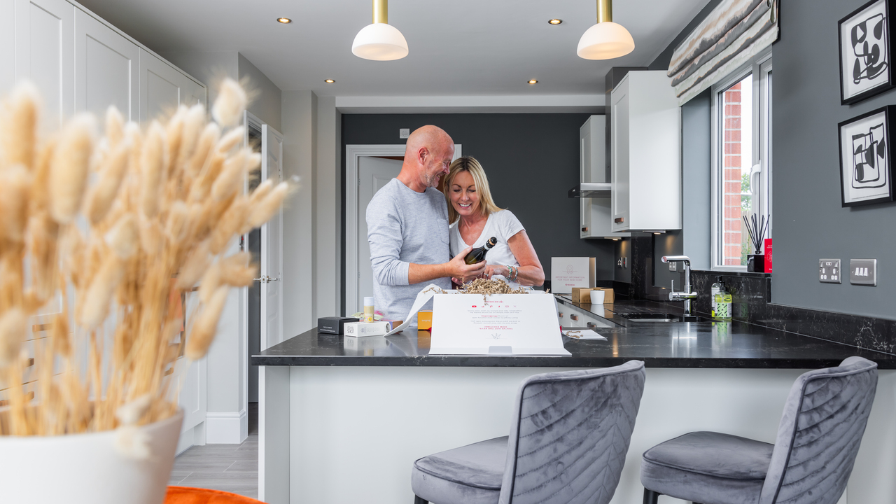 Couple in their new home