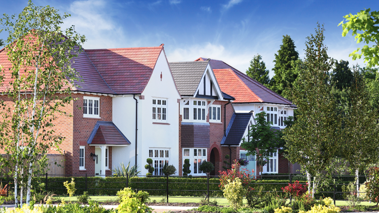 A row of Heritage style homes surrounded by attractive greenery