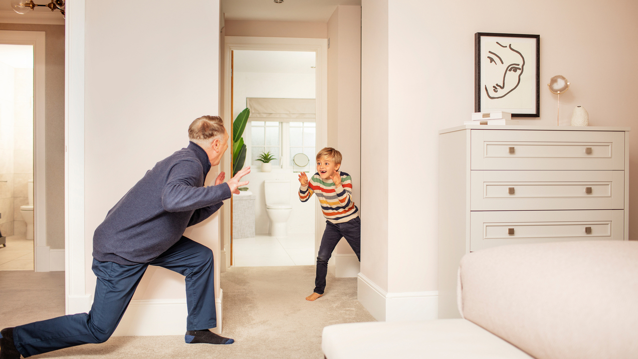 Grandfather and child playing games