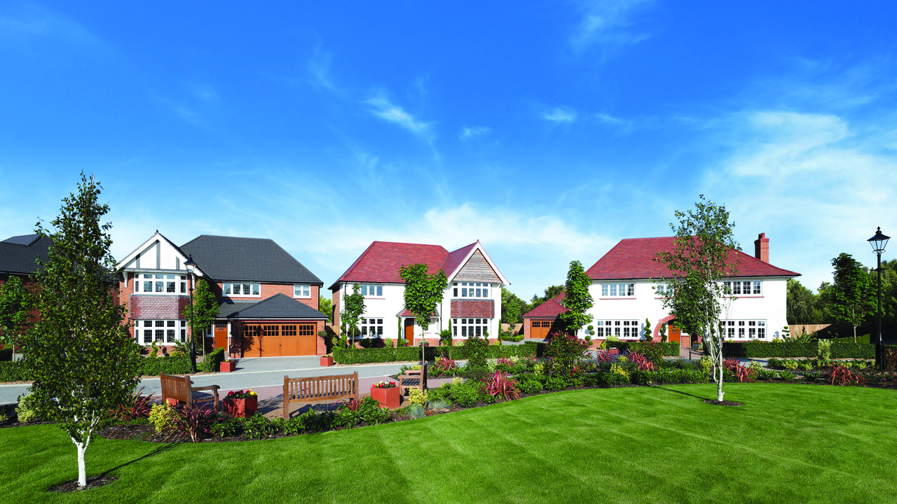 Row of Heritage homes surrounding a beautifully-landscaped community garden 