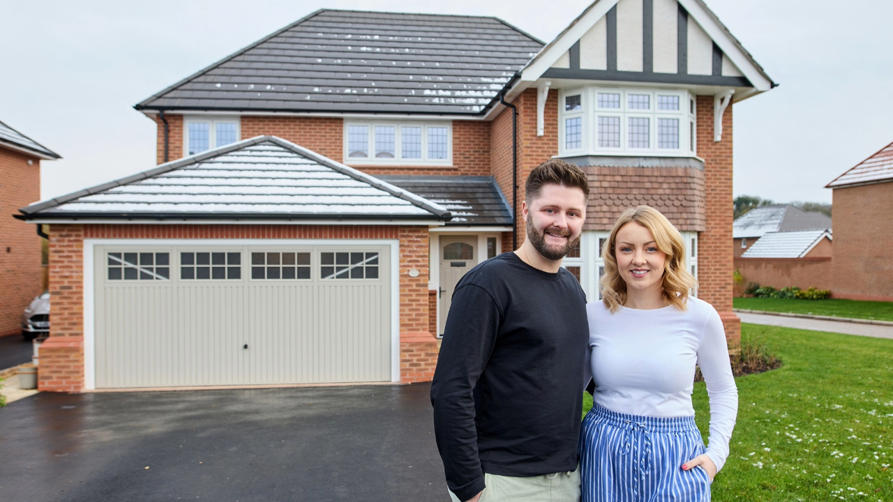 Connor and Rachel outside their Henley home