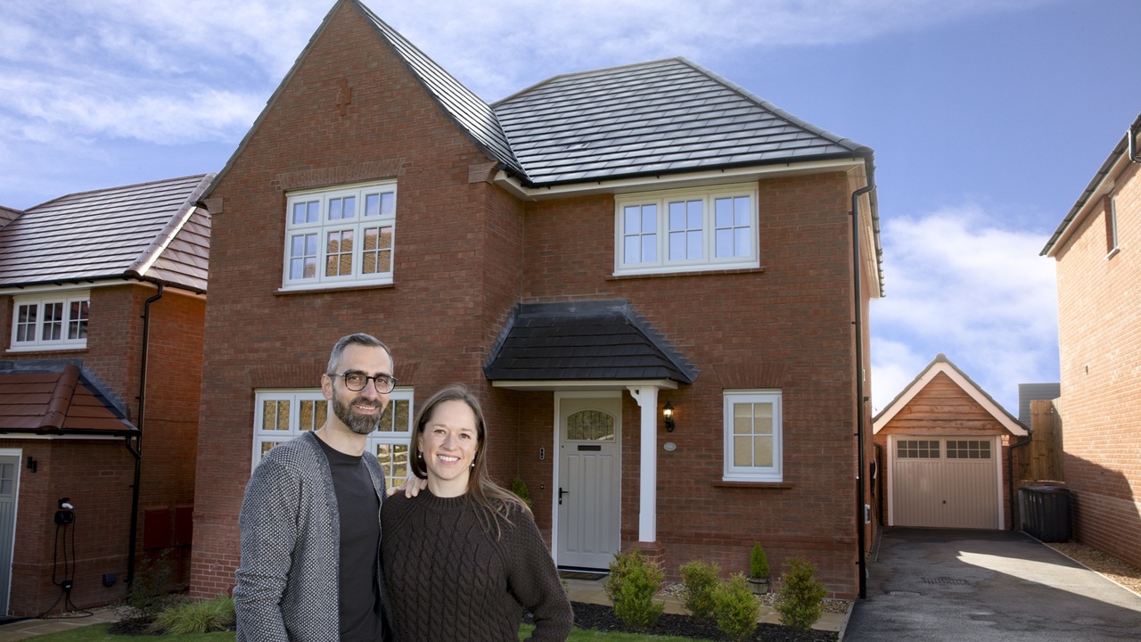Nic and Sarah outside their Cambridge home