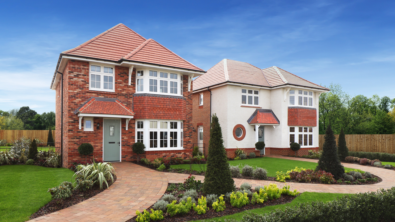 Two Redrow Heritage homes with beautifully-presented front gardens