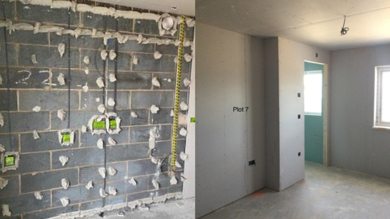 A wall covered in adhesive ready for drylining