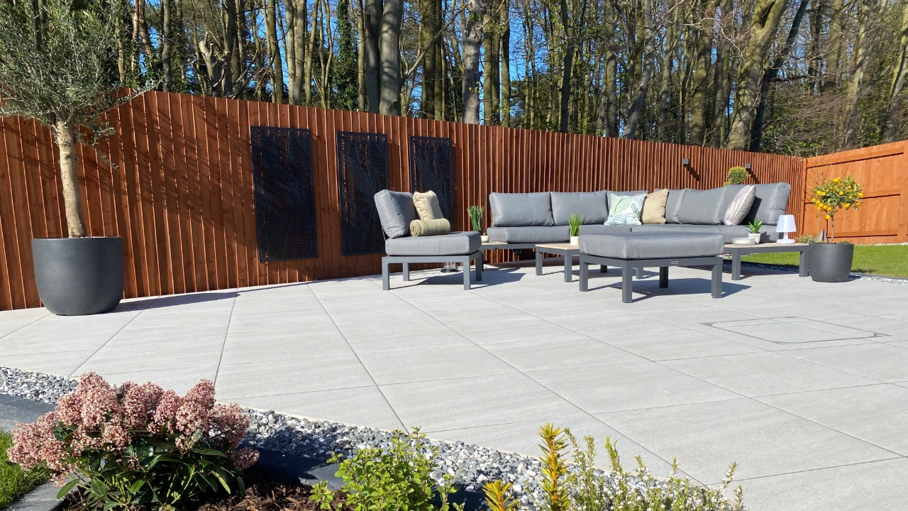 Large garden patio with sofa seating