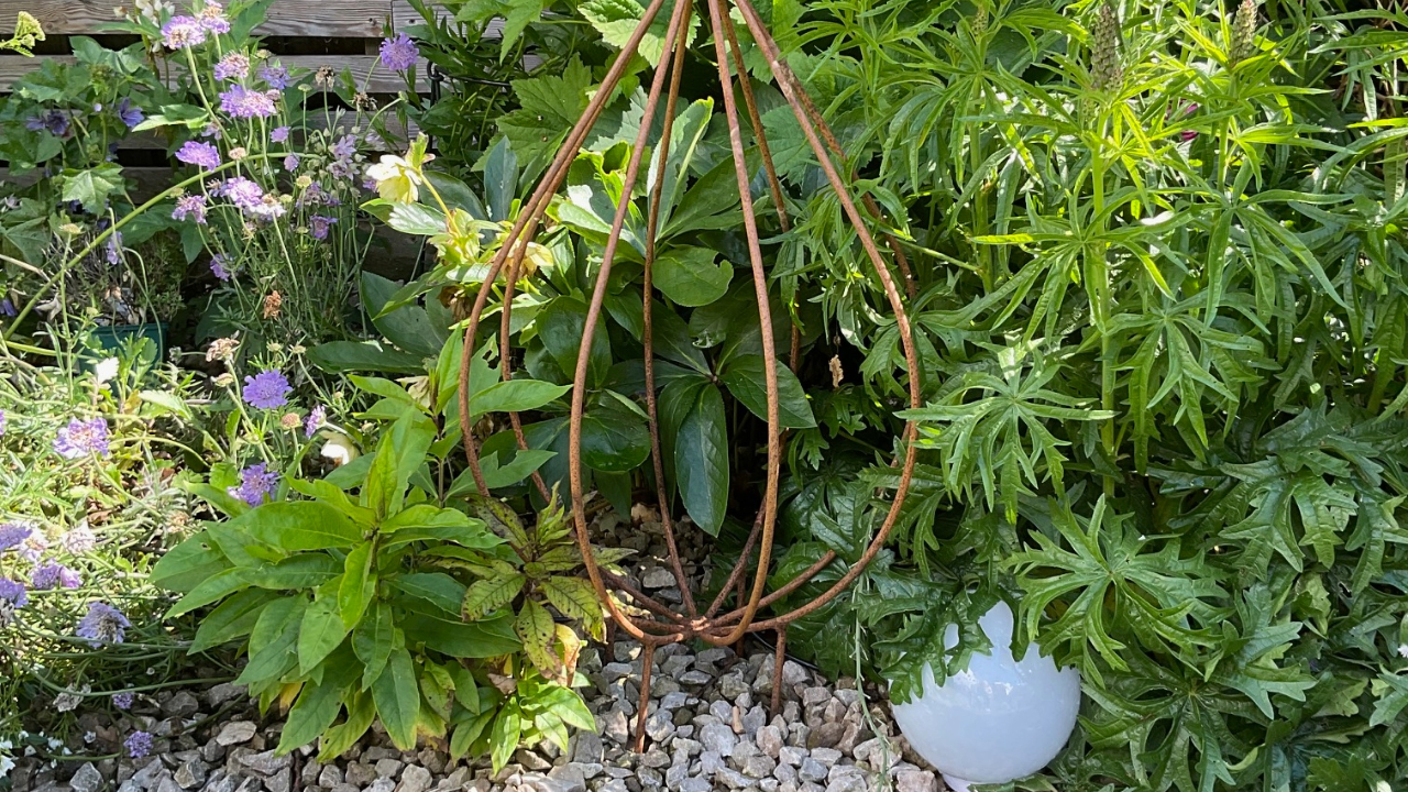 Garden globe light and wicker decoration
