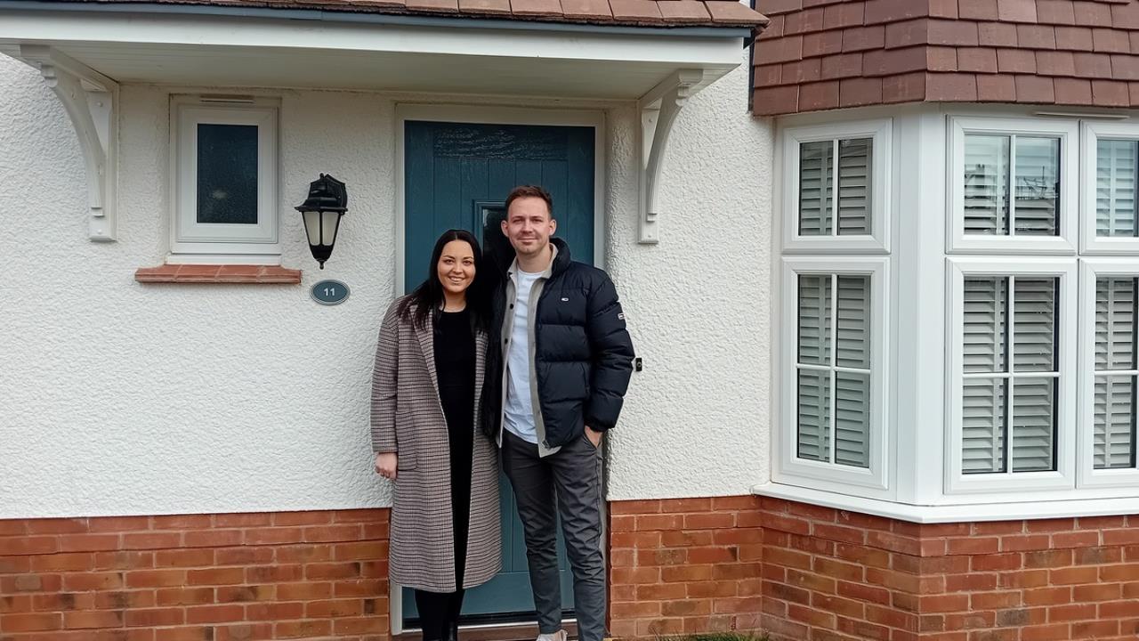Emily and Nathan at their new house in St Michael’s Meadow