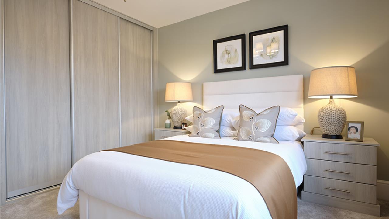 Bedroom with pale green walls