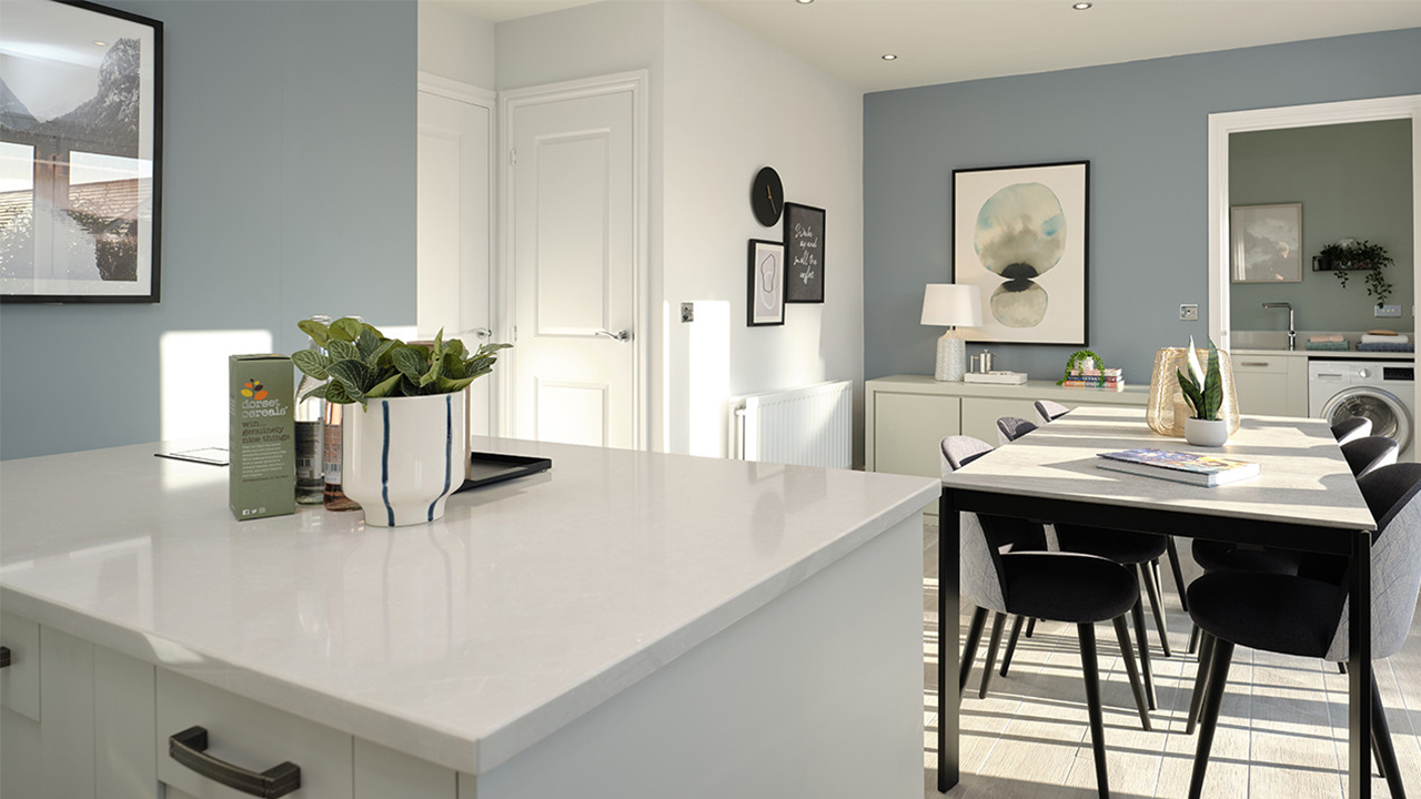 Kitchen and dining area with blue walls