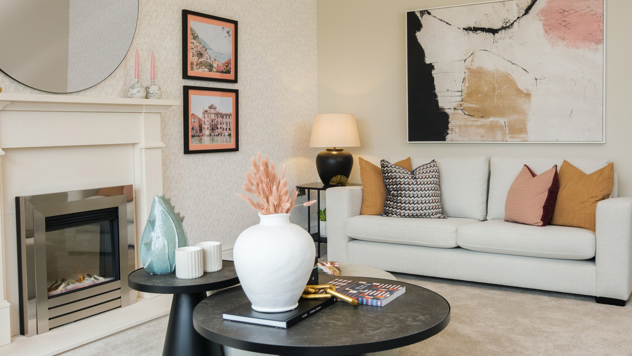 Cosy lounge with cream, pink and ochre colour palette