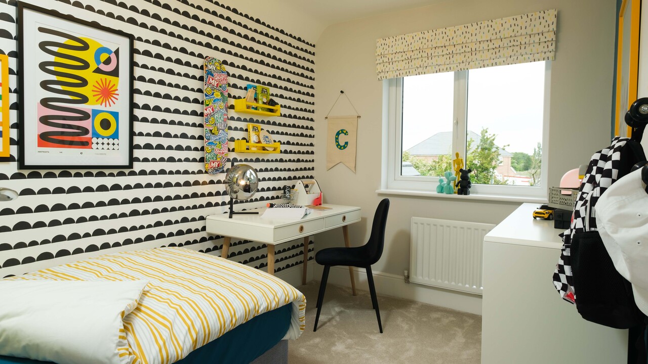 Colourful bedroom with black and white wallpaper