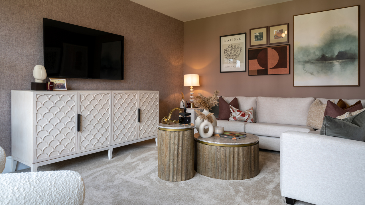 Lounge with a picture wall featuring different art styles