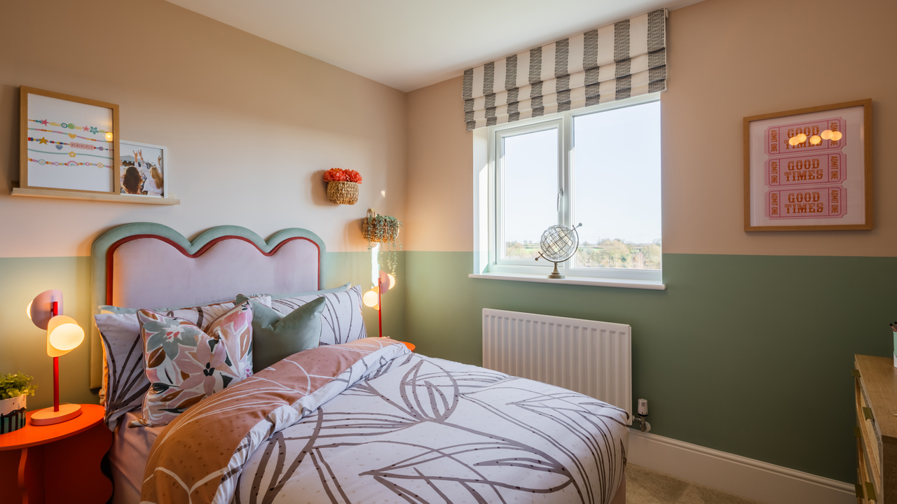 Cheerful bedroom in shades of pink and green