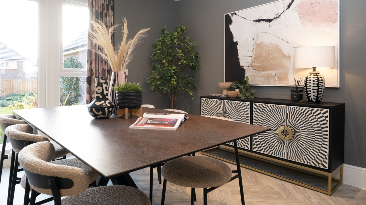 Dining room with feature sideboard and dark wood table