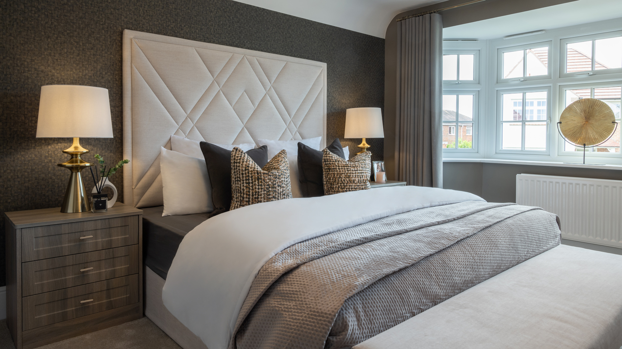 Boutique hotel style bedroom with opulent gold accessories
