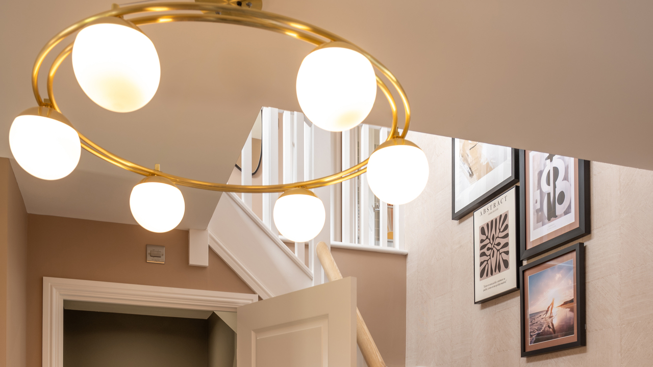 Hallway with structural gold light fitting