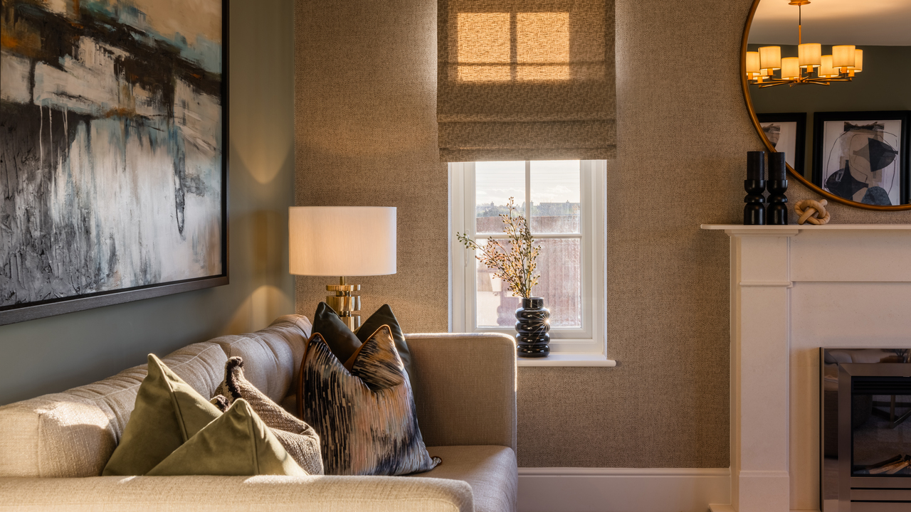 Lounge with large abstract artwork over the sofa and a chic window blind