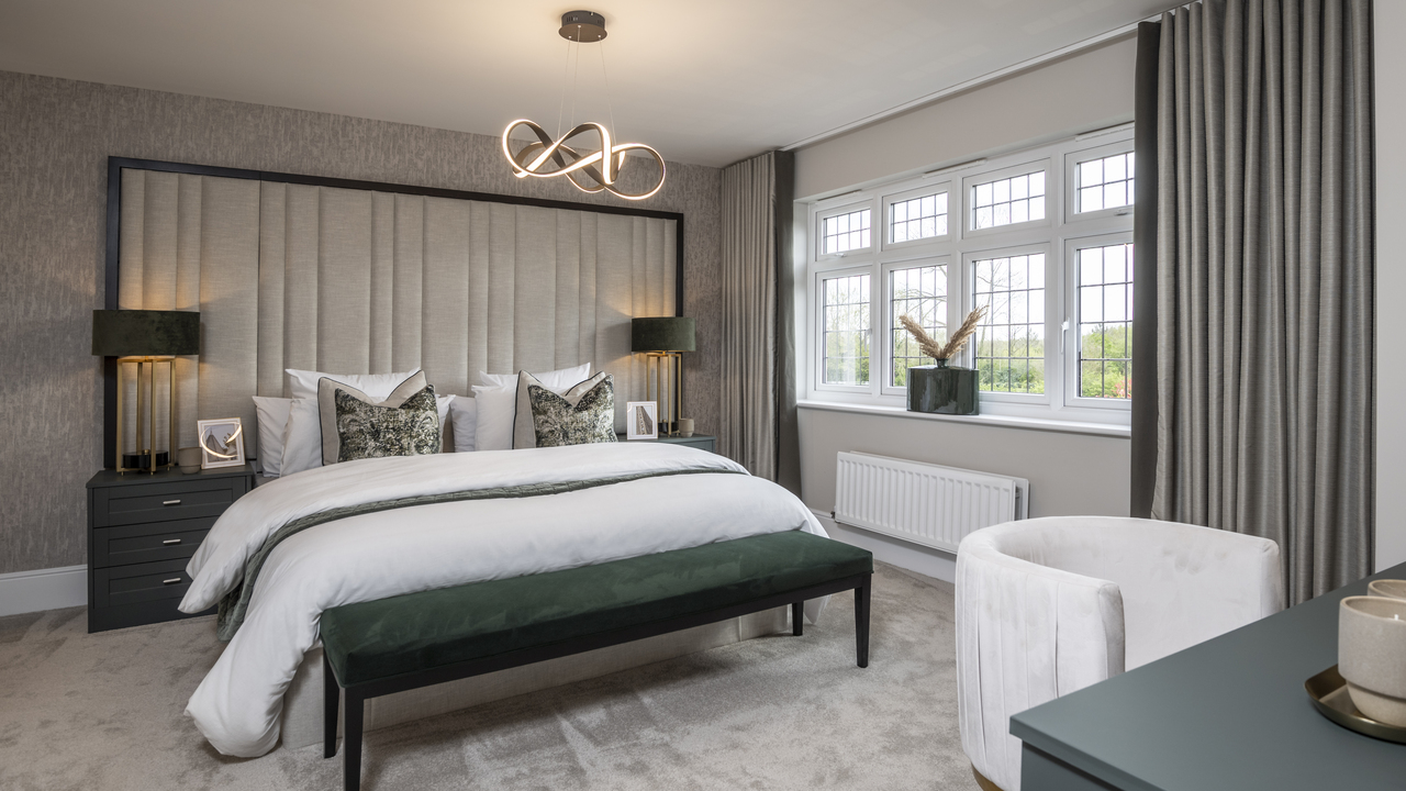 Large main bedroom in calm, neutral colours