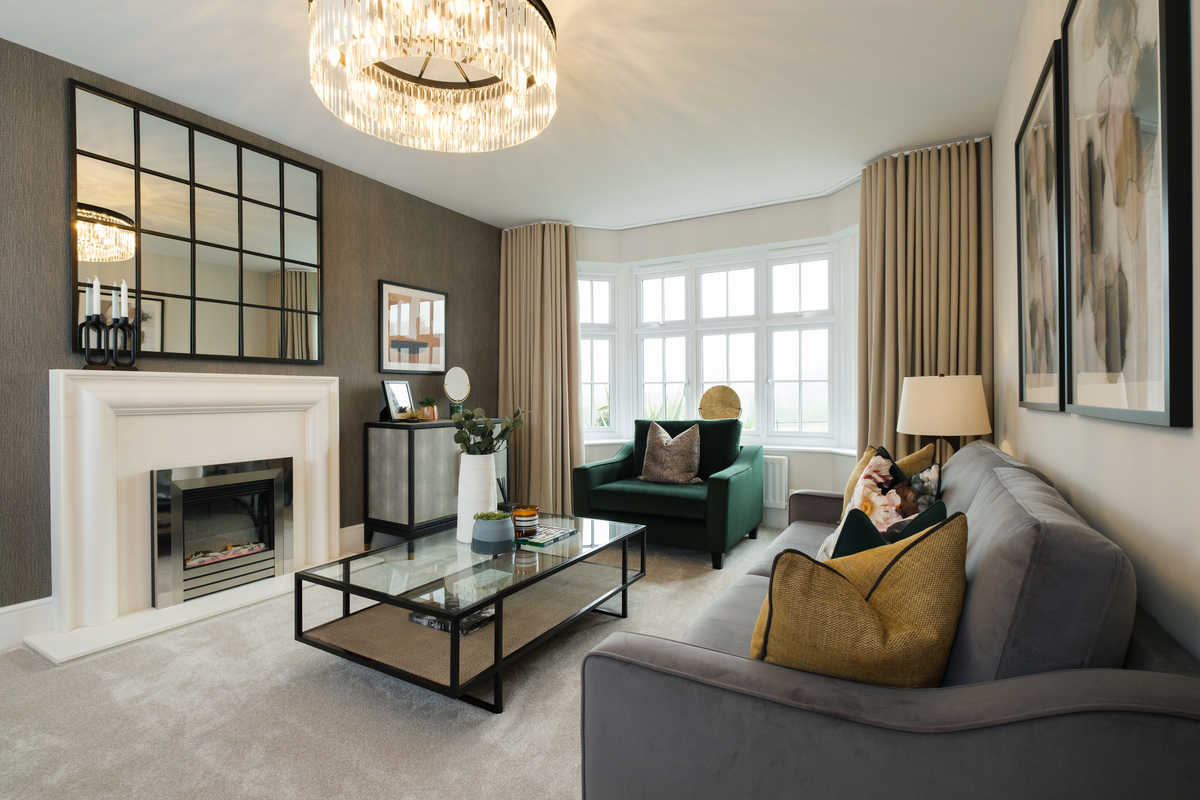 Sophistically styled lounge with large window mirror over a fireplace