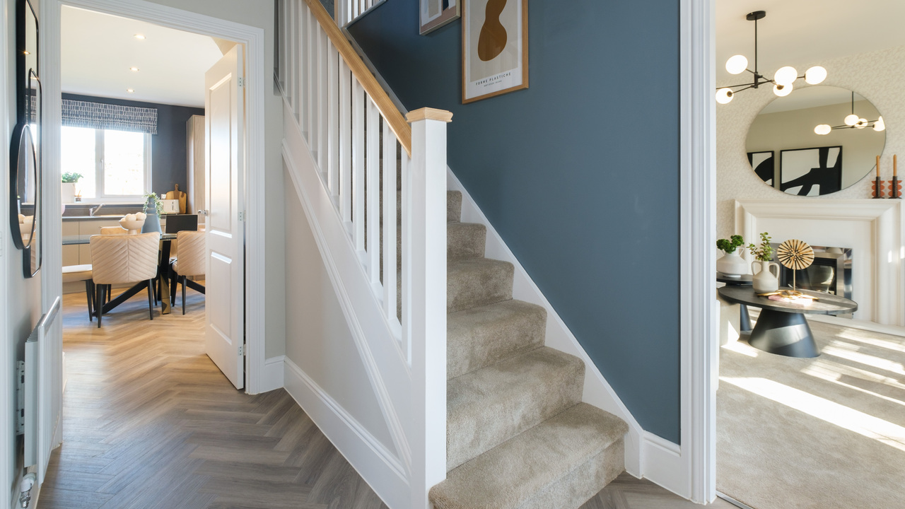 Hallway leading to a lounge and kitchen