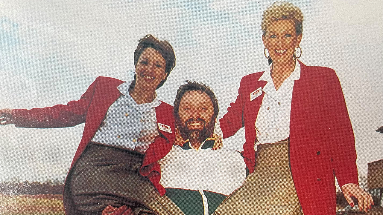 Strongman Geoff Capes lifts two Redrow sales associates