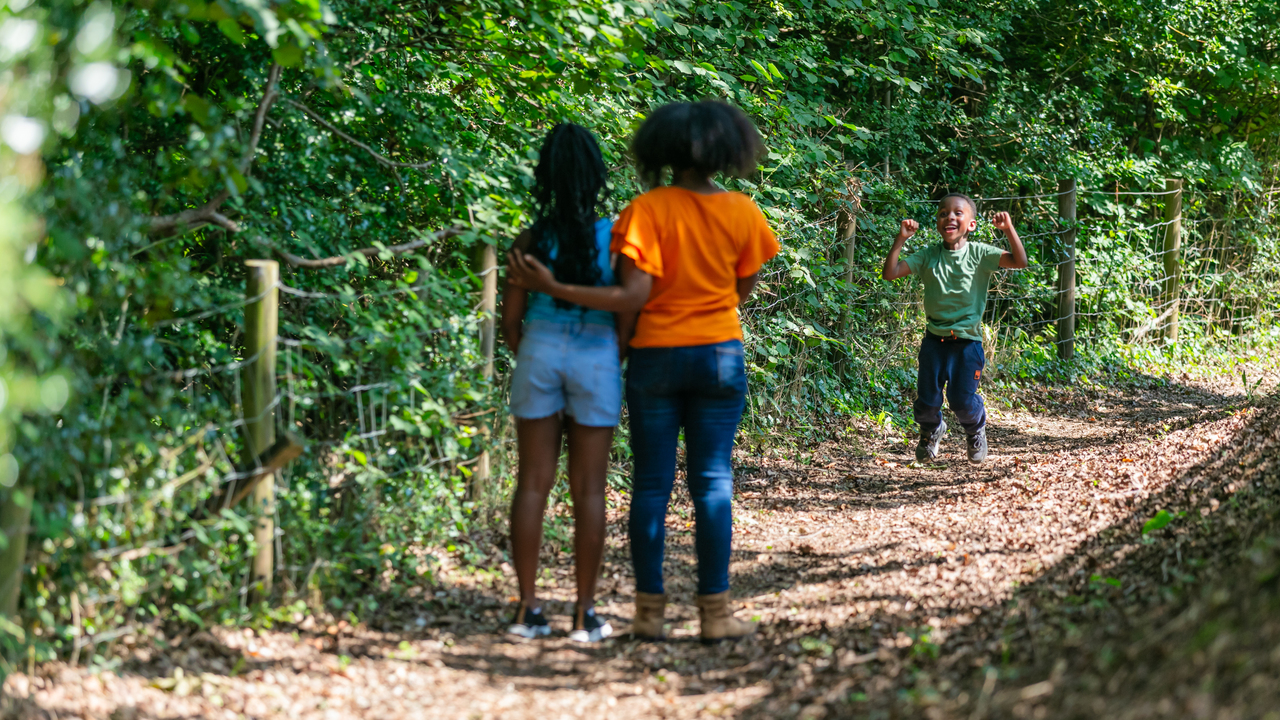 Children playing and walking near The Churchlands South Wales