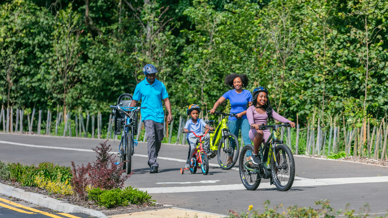 Family riding bikes together