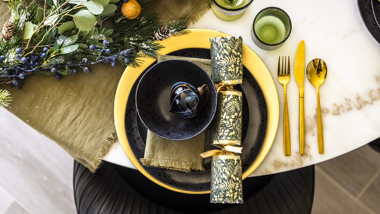 Green and gold theme Christmas table setting